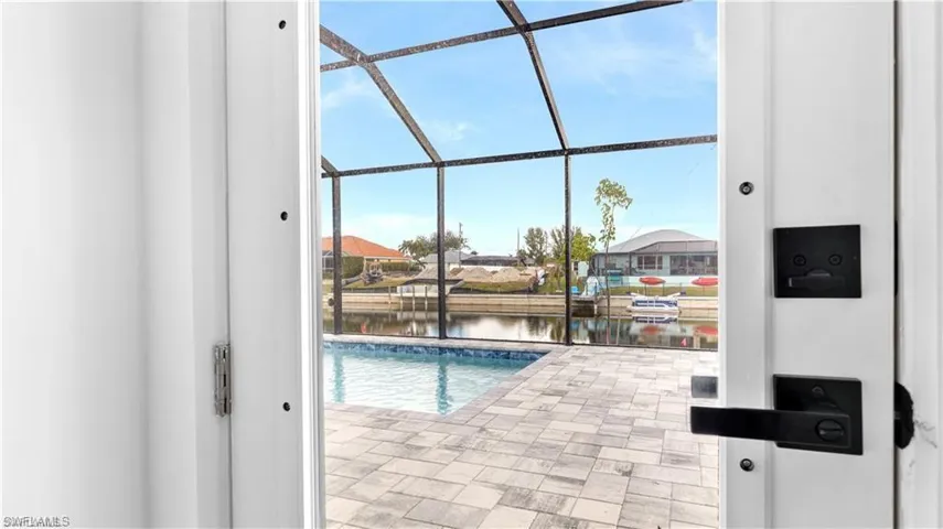 View of swimming pool with a water view