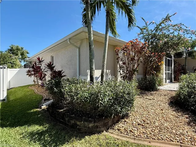 View of side of property with stucco siding