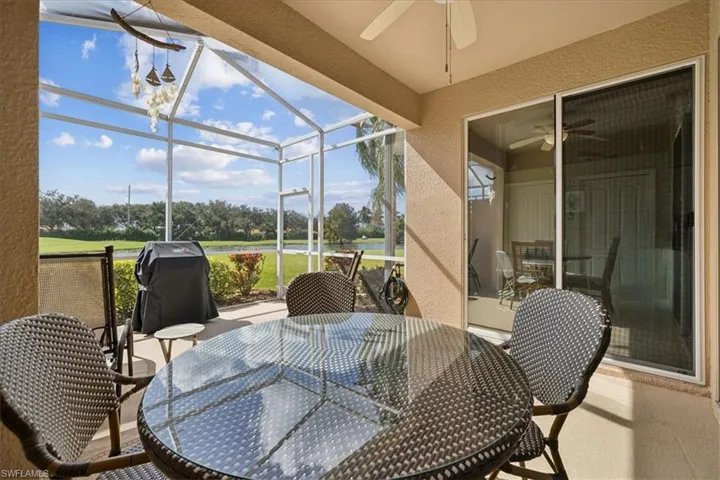 Sunroom featuring ceiling fan