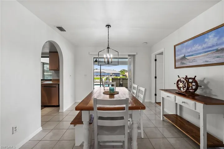 Dining room with patio door to the pool area