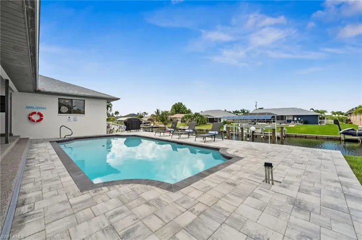 Saltwater pool with new patio pavers