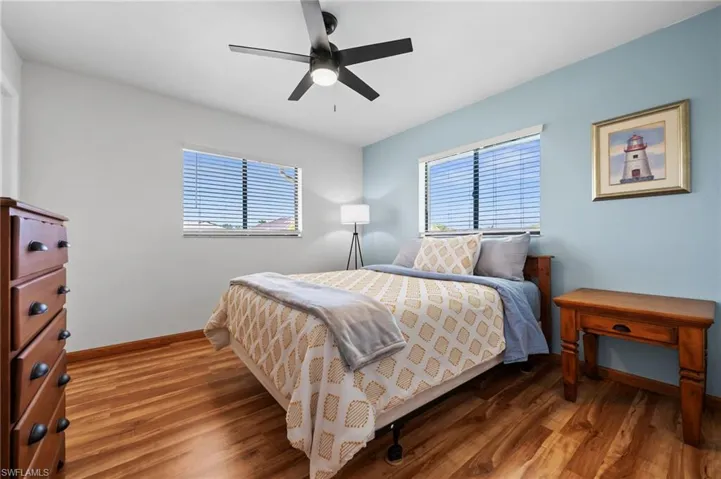Third Bedroom with walk-in closet and view of the pool and canal