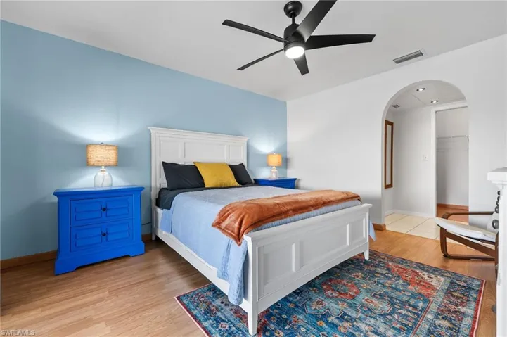 Primary/Master suite with patio door to the pool
