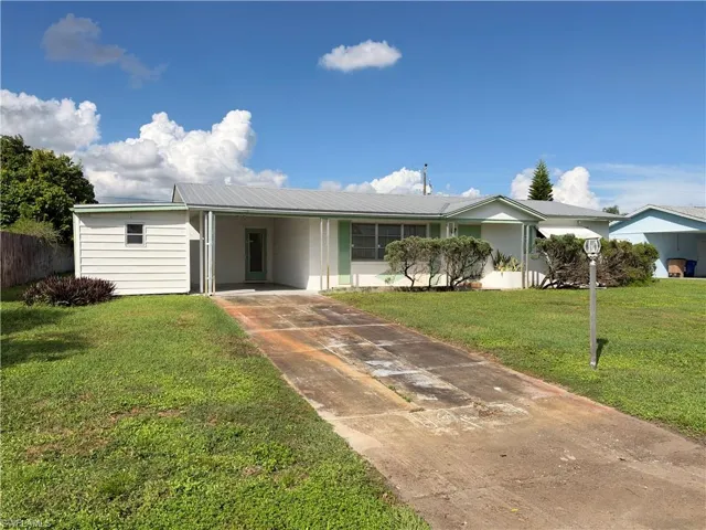 1419 Kimdale St E, Lehigh Acres, Florida 33936