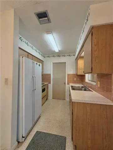 1419 Kimdale St E, Lehigh Acres, Florida 33936