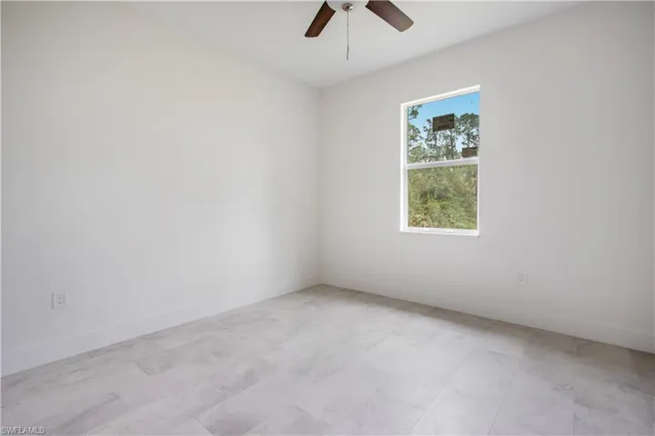Unfurnished room with ceiling fan