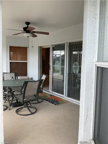 View of patio featuring ceiling fan