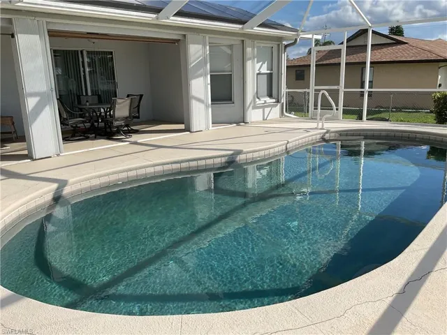 View of heated swimming pool featuring apatio