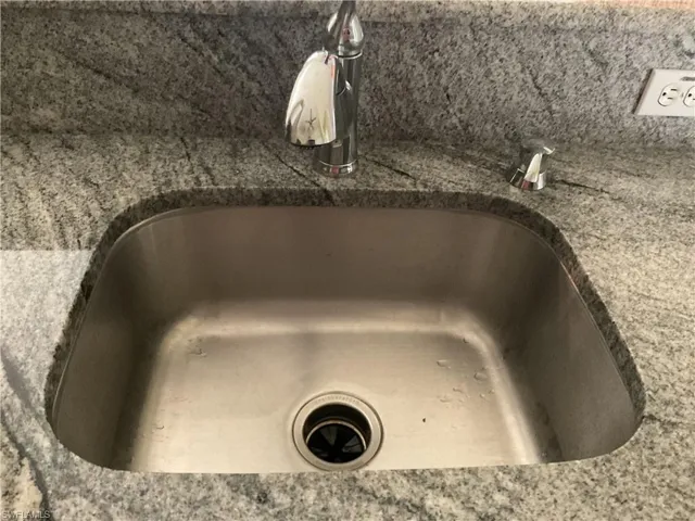 Details with sink and stone countertops