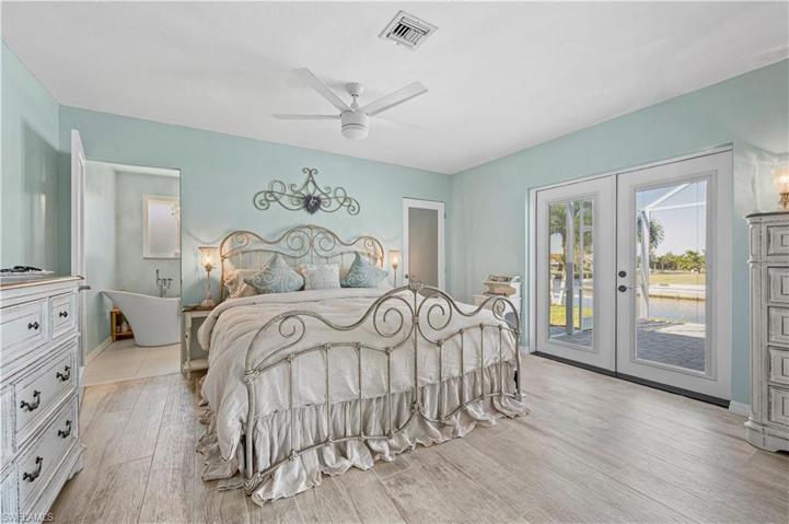 Master bedroom with French doors to lanai