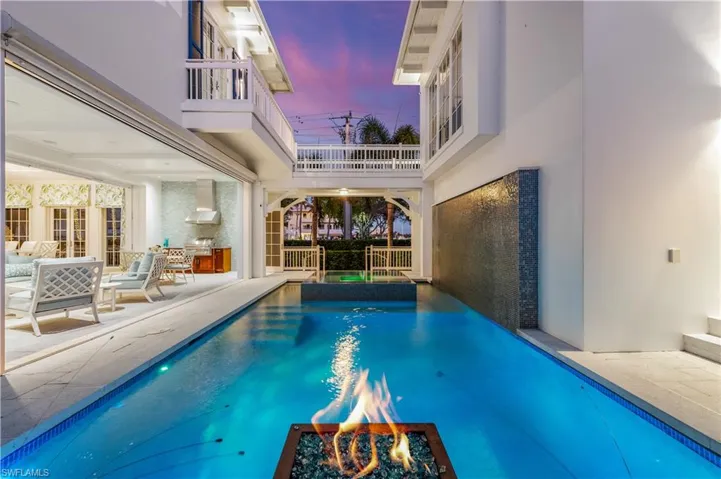 View of pool at dusk