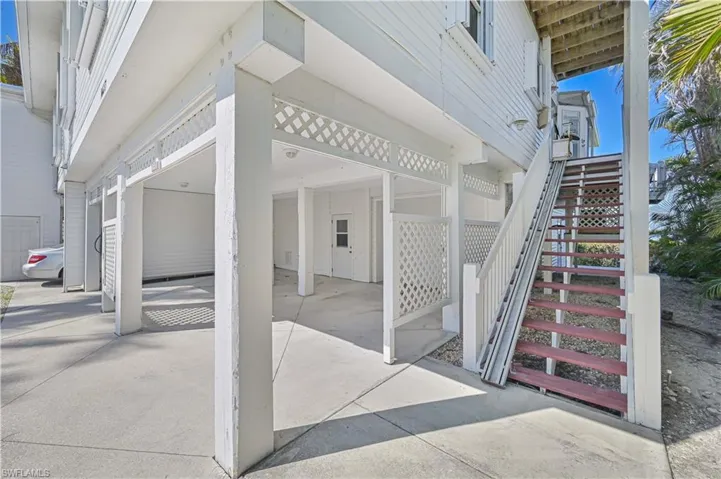 Under cover parking and two car garage with storage room