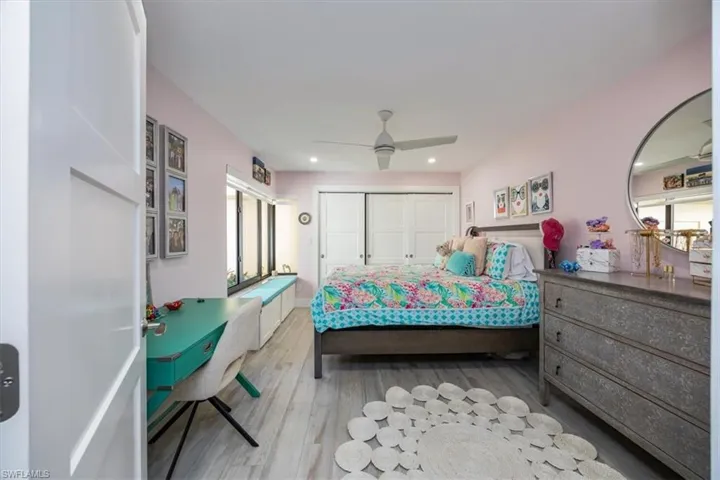 Bedroom 3 with large view of courtyard