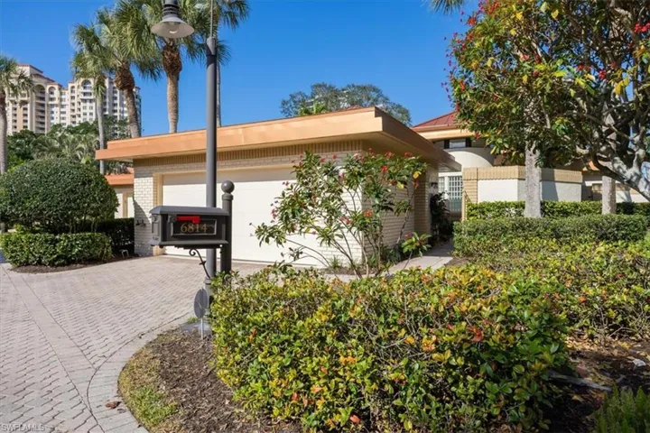 View of front of property with 2 car garage