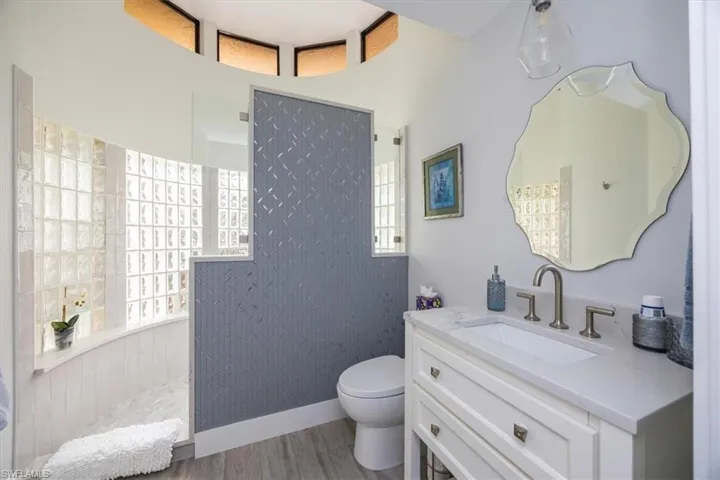 Bottle glass circular shower with amazing tile