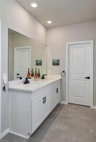 Bathroom featuring twin sinks vanity