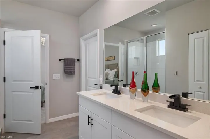 Bathroom with dual bowl vanity