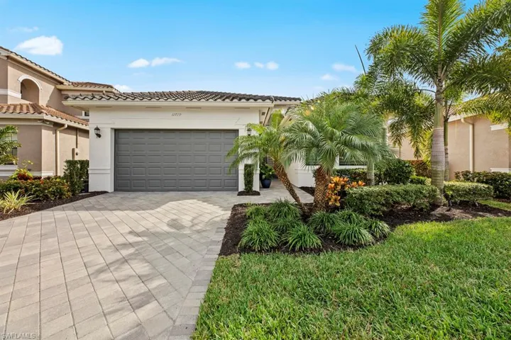 View of front of property with a garage