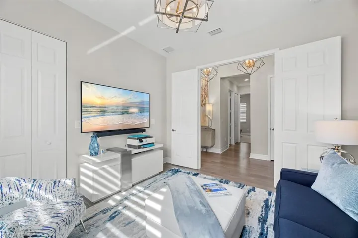Living room with hardwood / wood-style floors