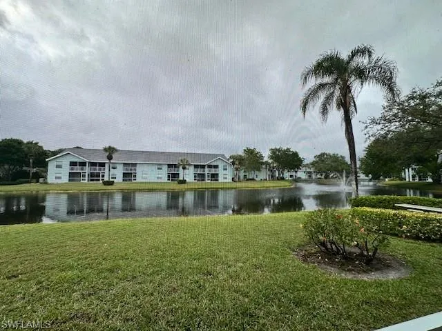 Serene views to the community lake - a charming footbridge just to the right out of screen
