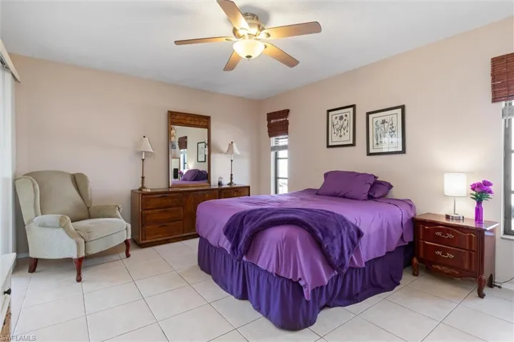 Bedroom featuring ceiling fan and light tile patterned floors