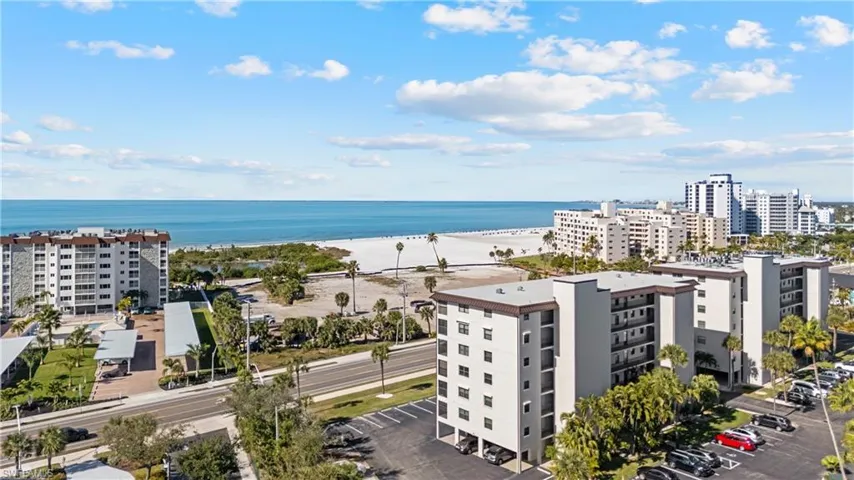 Bird's eye view of apartment complex / building and a large body of water