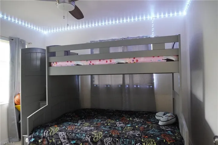 Bedroom featuring a ceiling fan