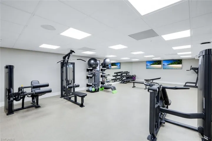 Gym featuring a paneled ceiling