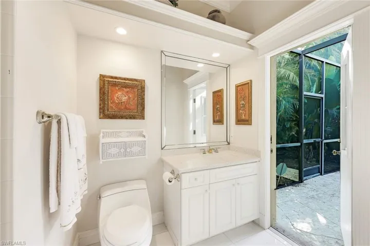 Half bath with vanity and ornamental molding