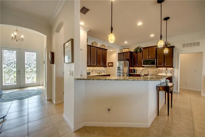Great Flow From Foyer W/Lovely, Light Tile Flooring