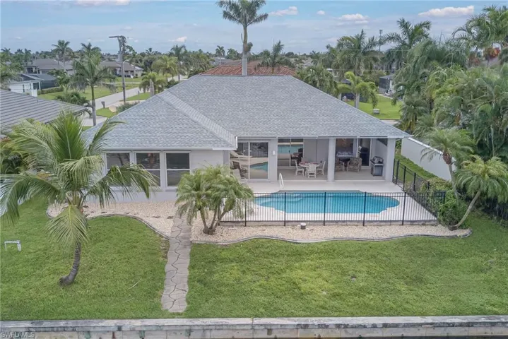 View of pool featuring a patio and a fenced backyard