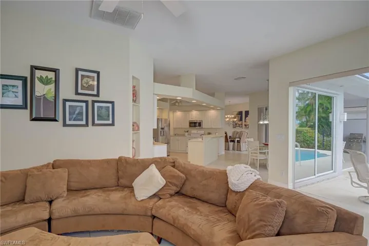 Living room featuring a ceiling fan