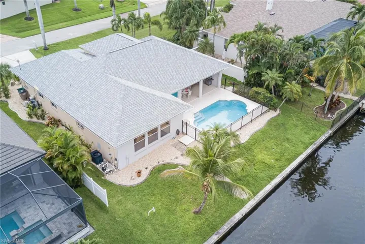 View from above of property featuring a pool
