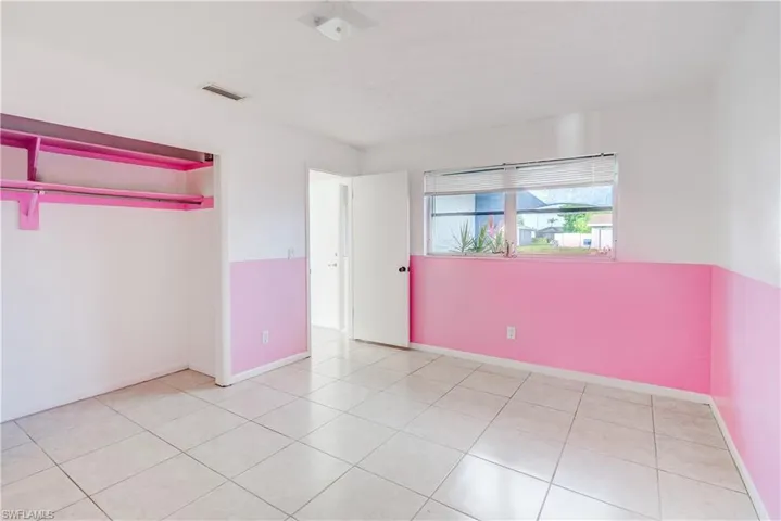 Spare room featuring tile patterned flooring