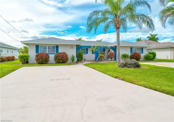 Single story home featuring a front yard