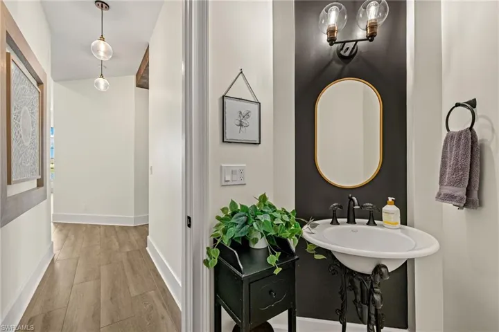Bathroom with hardwood / wood-style floors