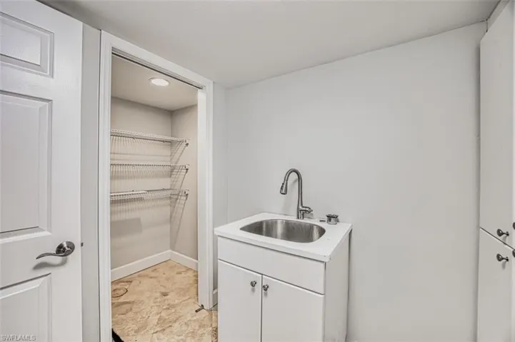 Laundry Room sink and storage closet