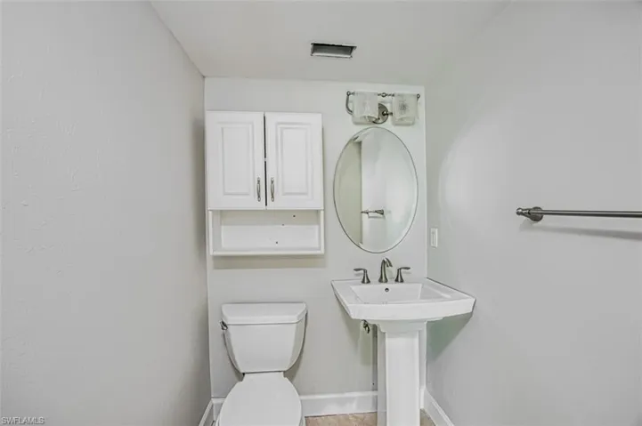 Half back adjacent to den/office space