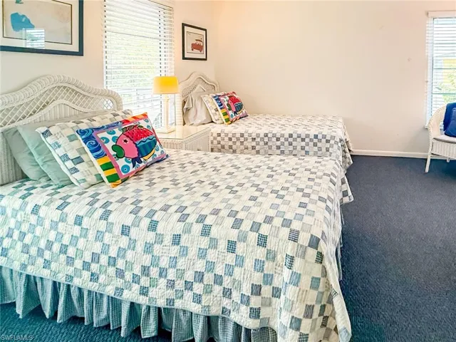 Living area with light tile patterned floors