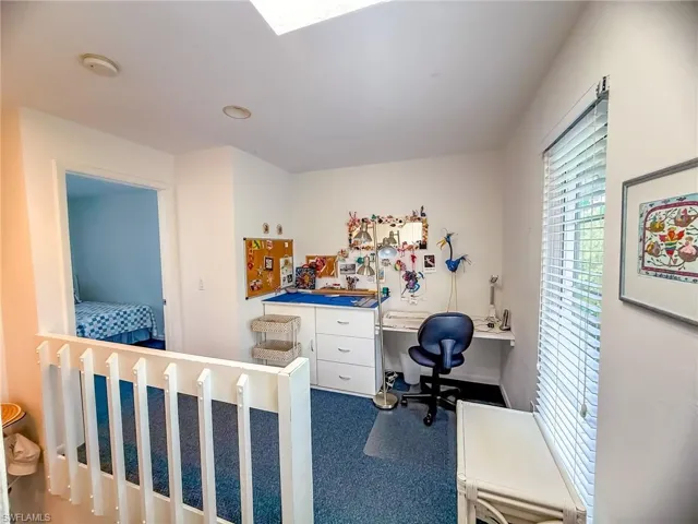 Bathroom with double vanity and tile patterned flooring
