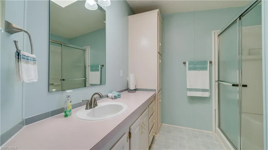 So much counter space. So much cabinetry. And; an updated, walk-in shower with seats.