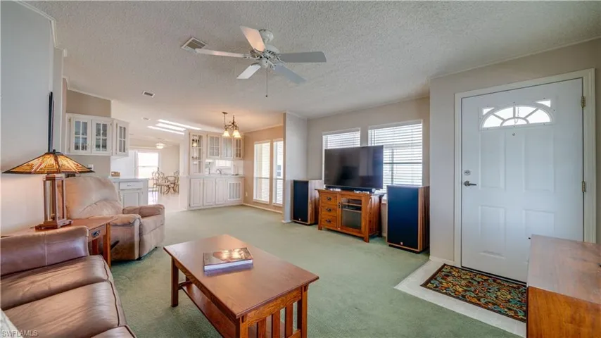 The living room is large and will easily accommodate your furniture and furnishings.