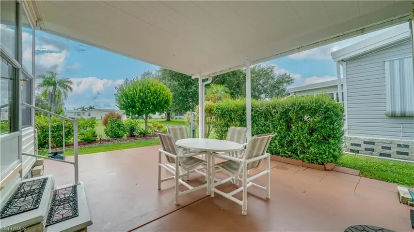 This lovely outdoor space is easily accessed from the rear entrance to the home.