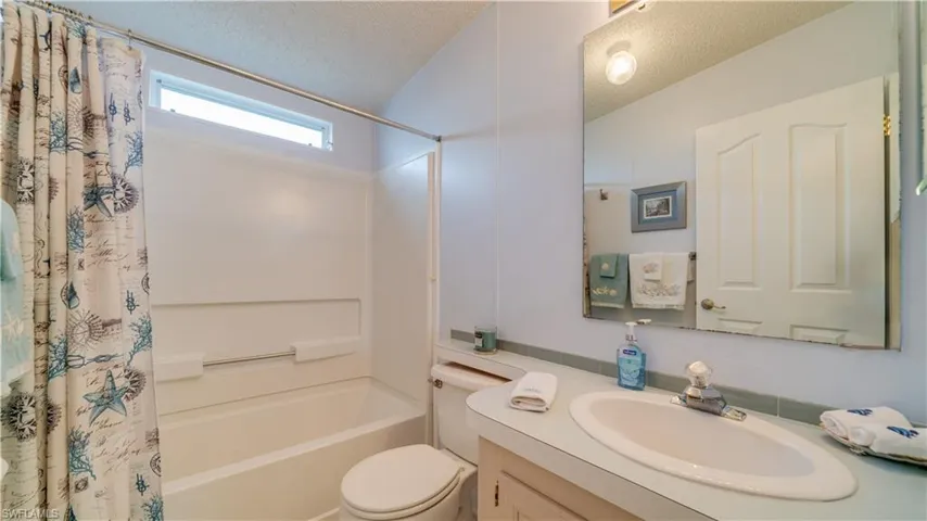 The guest bathroom is pristine. The shower and tub - like new.