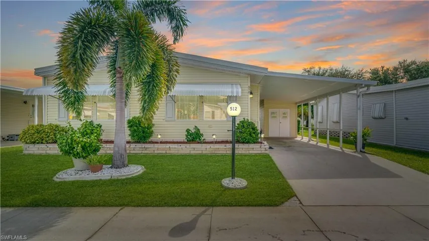 Southwest Florida sunrises abound behind this must-see home.