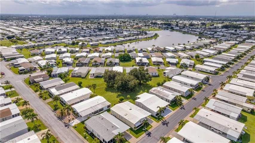 Enjoy the birdseye view of the lovely open green space, perfectly positioned, behind this home.