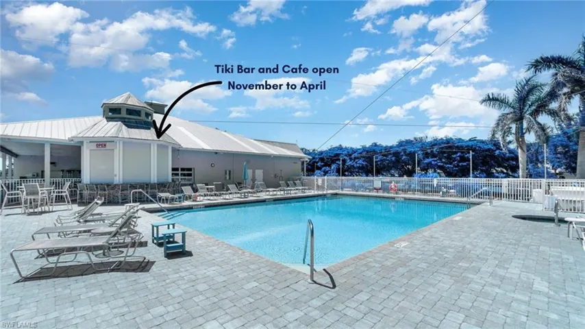 Pool area with seasonal Tiki bar and cafe
