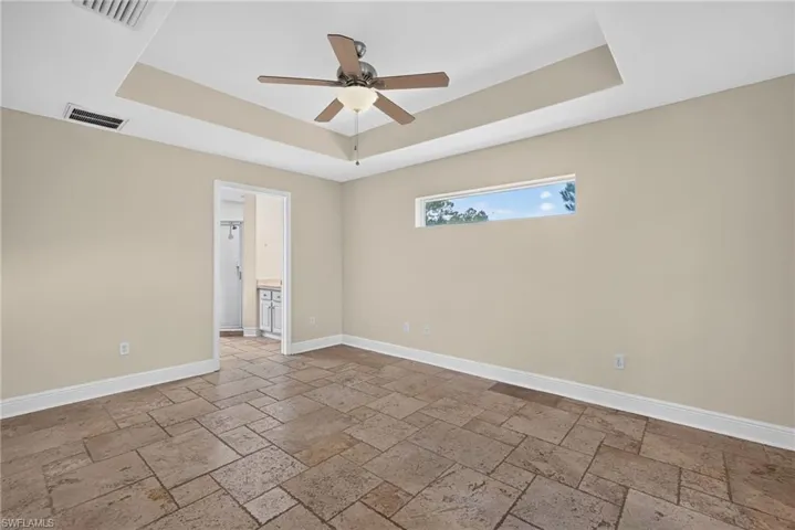 Master bedroom with master bath past door