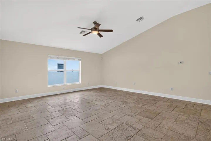 Rear living room, possible conversion to 4th bedroom or study