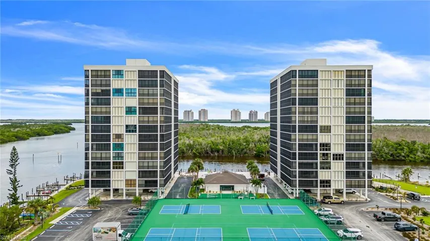 View of building exterior featuring a water view